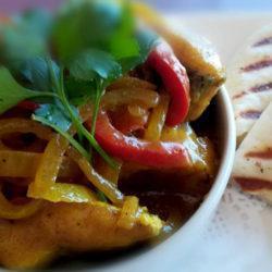 Pickled Fish served with a Naan bread